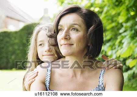 Stock Photo - Portrait of mother and daughter. Fotosearch