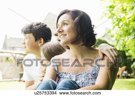 Portrait of mother with son and daughter View Large Photo Image Picture - Portrait of mother with son and daughter. Fotosearch