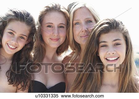 Portrait of mother with three daughters View Large Photo Image Stock Photography - Portrait of mother with three daughters. Fotosearch