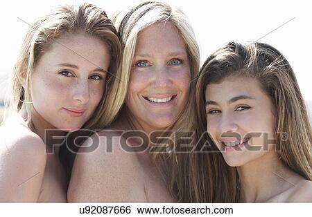 Portrait of mother with two daughters View Large Photo Image Stock Photograph - Portrait of mother with two daughters. Fotosearch