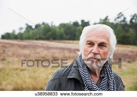 Portrait of senior man with grey hair View Large Photo Image Stock Image - Portrait of senior man with grey hair. Fotosearch