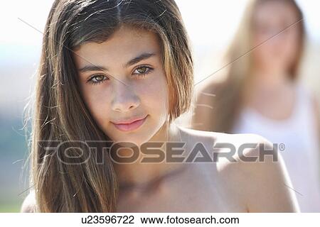 Portrait of teenage girl, focus on foreground View Large Photo Image Stock Image - Portrait of teenage girl, focus on foreground. Fotosearch