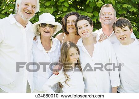 Stock Image - Portrait of three generation family. Fotosearch
