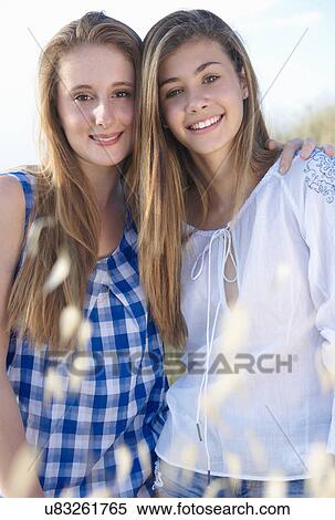 Portrait of two teenage girls, Tuscany, Italy View Large Photo Image Stock Photography - Portrait of two teenage girls, Tuscany, Italy. Fotosearch