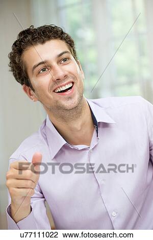Portrait of young man View Large Photo Image Stock Image - Portrait of young man. Fotosearch