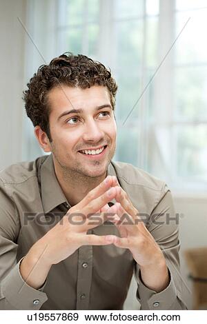 Stock Photo - Portrait of young man. Fotosearch