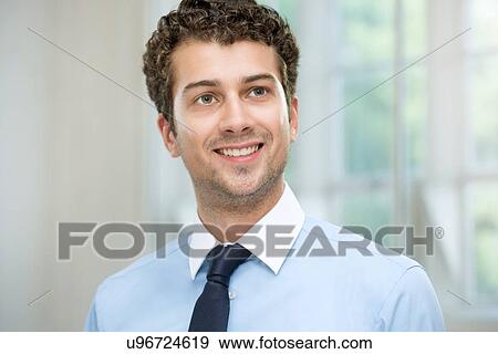 Stock Photo - Portrait of young man. Fotosearch