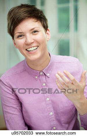 Portrait of young woman View Large Photo Image Stock Image - Portrait of young woman. Fotosearch