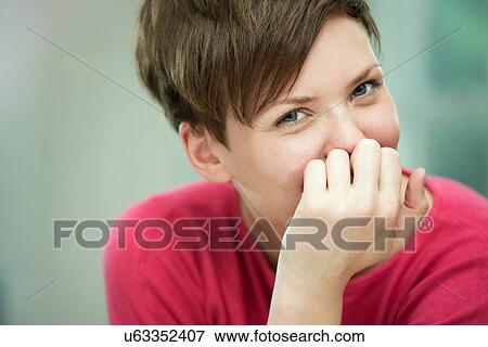 Portrait of young woman View Large Photo Image Stock Photo - Portrait of young woman. Fotosearch