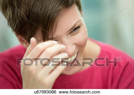 Stock Photograph - Portrait of young woman. Fotosearch
