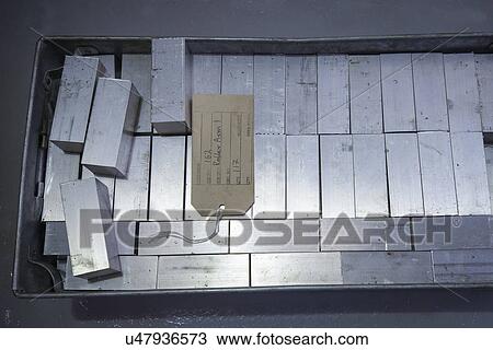 Raw metal in engineering works View Large Photo Image Stock Image - Raw metal in engineering works. Fotosearch