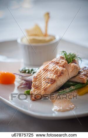 Salmon fillet with sauce and garnish View Large Photo Image Stock Photography - Salmon fillet with sauce and garnish. Fotosearch