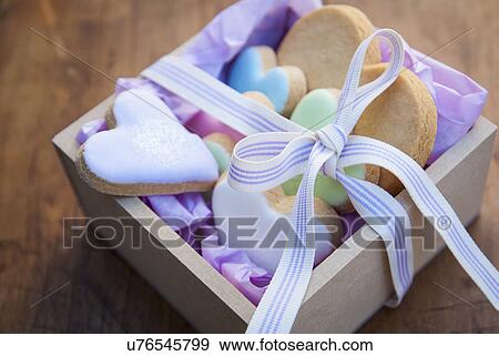 Still life with box of heart shaped cookies View Large Photo Image Stock Photo - Still life with box of heart shaped cookies. Fotosearch