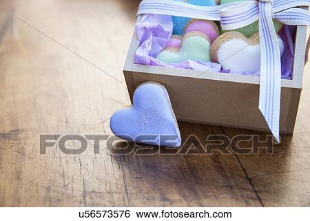 Still life with box of heart shaped cookies View Large Photo Image Stock Photograph - Still life with box of heart shaped cookies. Fotosearch