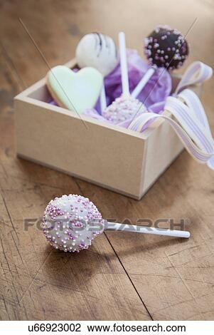 Still life with box of lollipops View Large Photo Image Stock Image - Still life with box of lollipops. Fotosearch