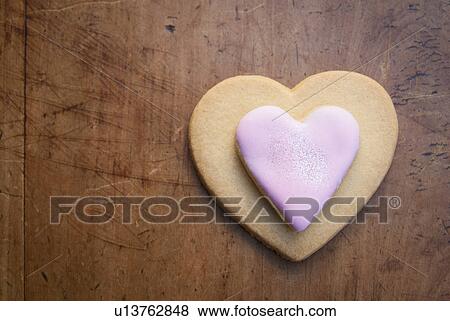 Still life with heart shaped cookie View Large Photo Image Stock Photo - Still life with heart shaped cookie. Fotosearch