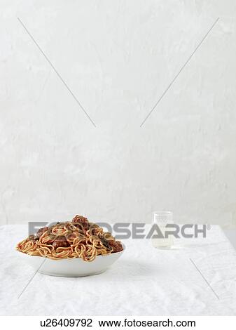 Still life with spaghetti and meatballs with white wine View Large Photo Image Stock Image - Still life with spaghetti and meatballs with white wine. Fotosearch