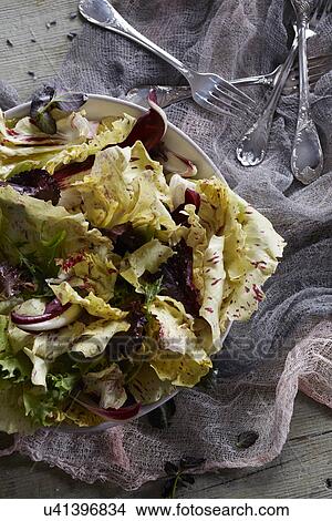 Still life with yellow radicchio salad View Large Photo Image Picture - Still life with yellow radicchio salad. Fotosearch
