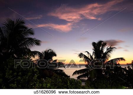 Sunset over the sea at Praslin, Seychelles View Large Photo Image Stock Photograph - Sunset over the sea at Praslin, Seychelles. Fotosearch