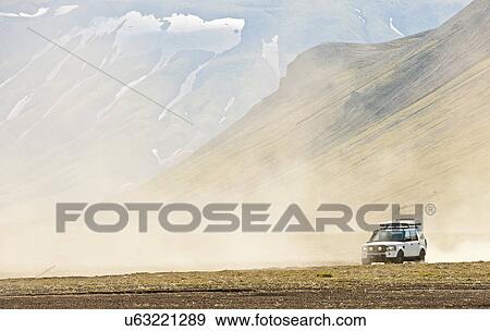 SUV driving on the Icelandic highlands, Fjallabak, Iceland View Large Photo Image Stock Photo - SUV driving on the Icelandic highlands, Fjallabak, Iceland. Fotosearch