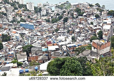 View of coastal favela from Casa Alto Vidigal, Rio De Janeiro, Brazil View Large Photo Image Stock Photo - View of coastal favela from Casa Alto Vidigal, Rio De Janeiro, Brazil. Fotosearch