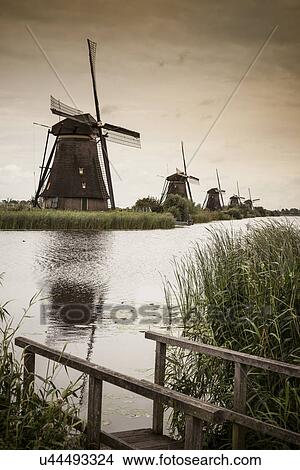 Picture - Windmills and canal, Kinderdijk, Olanda, Amsterdam. Fotosearch