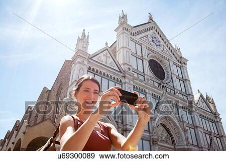 Woman outside Santa Croce church, Piazza di Santa Croce, Florence, Tuscany, Italy View Large Photo Image Stock Photo - Woman outside Santa Croce church, Piazza di Santa Croce, Florence, Tuscany, Italy. Fotosearch