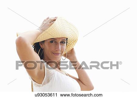 Stock Image - Woman posing for camera. Fotosearch