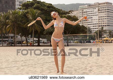 Woman standing with funny gesture on Copcacabana Beach, Rio de Janeiro, Brazil View Large Photo Image Stock Photo - Woman standing with funny gesture on Copcacabana Beach, Rio de Janeiro, Brazil. Fotosearch