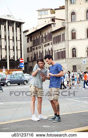 Young couple on city break, Florence, Tuscany, Italy View Large Photo Image Stock Photograph - Young couple on city break, Florence, Tuscany, Italy. Fotosearch