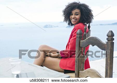 Young woman enjoying view from Casa Alto Vidigal, Rio De Janeiro, Brazil View Large Photo Image Stock Image - Young woman enjoying view from Casa Alto Vidigal, Rio De Janeiro, Brazil. Fotosearch