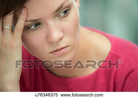 Young woman in deep thoughts View Large Photo Image Stock Photography - Young woman in deep thoughts. Fotosearch
