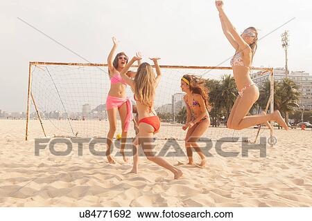 women playing volleyball