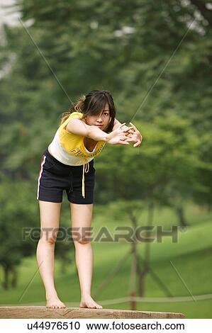 Beach, Exercising, Yoga, Body Care, Body Conscious, Fitness, Asian Ethnicity View Large Photo Image Stock Image - Beach, Exercising, Yoga, Body Care, Body Conscious, Fitness, Asian Ethnicity. Fotosearch