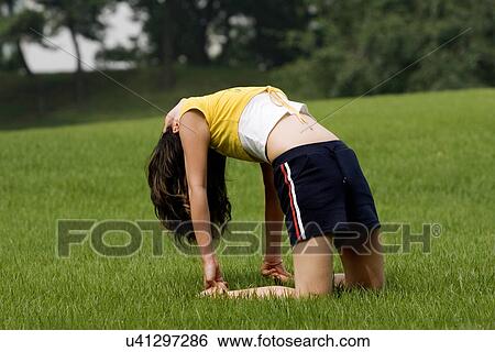 Beach, Exercising, Yoga, Body Care, Body Conscious, Fitness, Asian Ethnicity View Large Photo Image Stock Photograph - Beach, Exercising, Yoga, Body Care, Body Conscious, Fitness, Asian Ethnicity. Fotosearch
