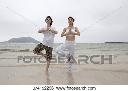 Beach, Exercising, Yoga, Body Care, Body Conscious, Fitness, Asian Ethnicity View Large Photo Image Stock Photograph - Beach, Exercising, Yoga, Body Care, Body Conscious, Fitness, Asian Ethnicity. Fotosearch