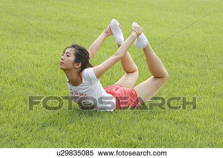 Beach, Exercising, Yoga, Body Care, Body Conscious, Fitness, Asian Ethnicity View Large Photo Image Stock Photography - Beach, Exercising, Yoga, Body Care, Body Conscious, Fitness, Asian Ethnicity. Fotosearch
