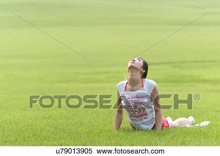Beach, Exercising, Yoga, Body Care, Body Conscious, Fitness, Asian Ethnicity View Large Photo Image Stock Photography - Beach, Exercising, Yoga, Body Care, Body Conscious, Fitness, Asian Ethnicity. Fotosearch