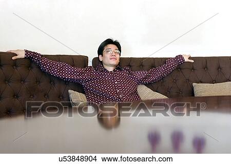 Picture - Greenery, Young Couple, Lying Down, Leisure Activity, Young Adult, Asian Ethnicity. Fotosearch