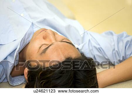 Greenery, Young Couple, Lying Down, Leisure Activity, Young Adult, Asian Ethnicity View Large Photo Image Stock Image - Greenery, Young Couple, Lying Down, Leisure Activity, Young Adult, Asian Ethnicity. Fotosearch