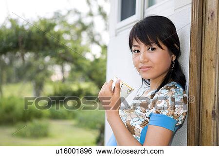 Greenery, Young Couple, Lying Down, Leisure Activity, Young Adult, Asian Ethnicity View Large Photo Image Stock Photograph - Greenery, Young Couple, Lying Down, Leisure Activity, Young Adult, Asian Ethnicity. Fotosearch