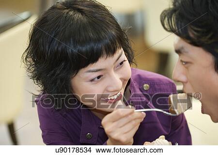Happiness, Young Men, Young Adult, Young Couple, Young Women, Togetherness, Asian Ethnicity View Large Photo Image Picture - Happiness, Young Men, Young Adult, Young Couple, Young Women, Togetherness, Asian Ethnicity. Fotosearch