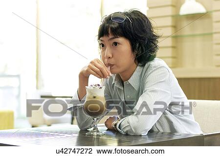 Stock Image - Happiness, Young Men, Young Adult, Young Couple, Young Women, Togetherness, Asian Ethnicity. Fotosearch