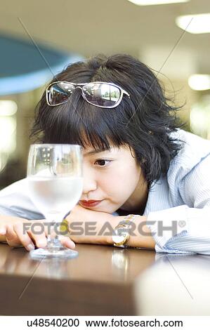 Stock Image - Happiness, Young Men, Young Adult, Young Couple, Young Women, Togetherness, Asian Ethnicity. Fotosearch