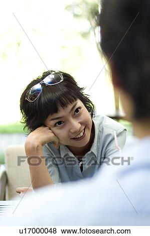 Stock Photo - Happiness, Young Men, Young Adult, Young Couple, Young Women, Togetherness, Asian Ethnicity. Fotosearch