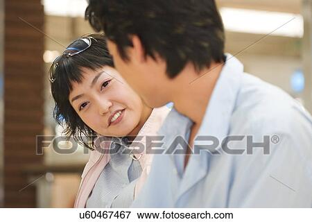 Stock Photo - Happiness, Young Men, Young Adult, Young Couple, Young Women, Togetherness, Asian Ethnicity. Fotosearch