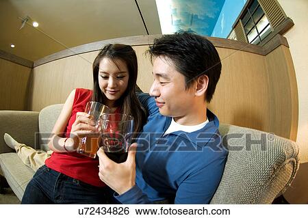 Happiness, Young Men, Young Adult, Young Couple, Young Women, Togetherness, Asian Ethnicity View Large Photo Image Stock Photograph - Happiness, Young Men, Young Adult, Young Couple, Young Women, Togetherness, Asian Ethnicity. Fotosearch