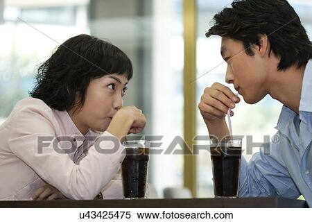 Stock Photography - Happiness, Young Men, Young Adult, Young Couple, Young Women, Togetherness, Asian Ethnicity. Fotosearch