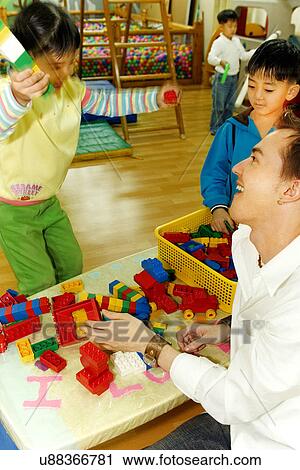 Stock Image - Indoors, Day, Pre-School, Children, Kids, Learning, Childhood. Fotosearch