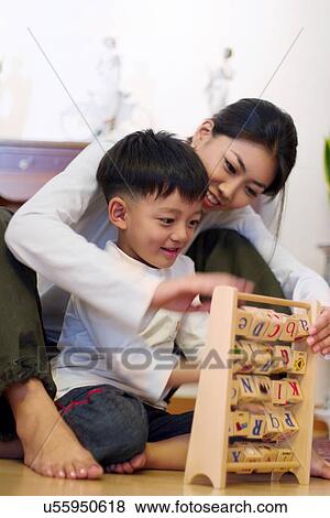 Stock Photo - Indoors, Day, Pre-School, Children, Kids, Learning, Childhood. Fotosearch